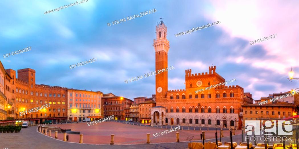 Stock Photo: Mangia Tower or Torre del Mangia towering above of the Palazzo Pubblico on Piazza del Campo in medieval city of Siena at beautiful sunrise, Tuscany, Italy.