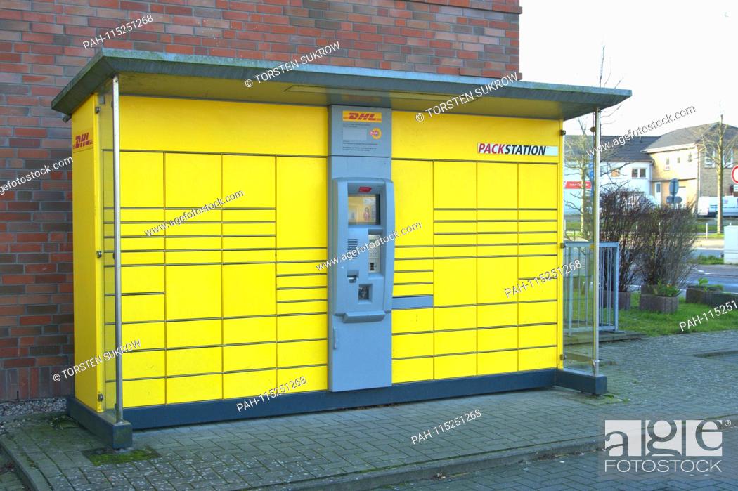 Stock Photo: A packing station of the parcel service DHL at the city field in Schleswig. It is a model trade system, where each package has its own compartment.