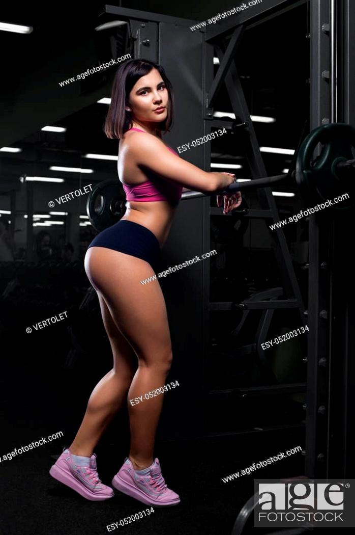 Biceps Pose Of A Young Woman In Gym101807  Meashots