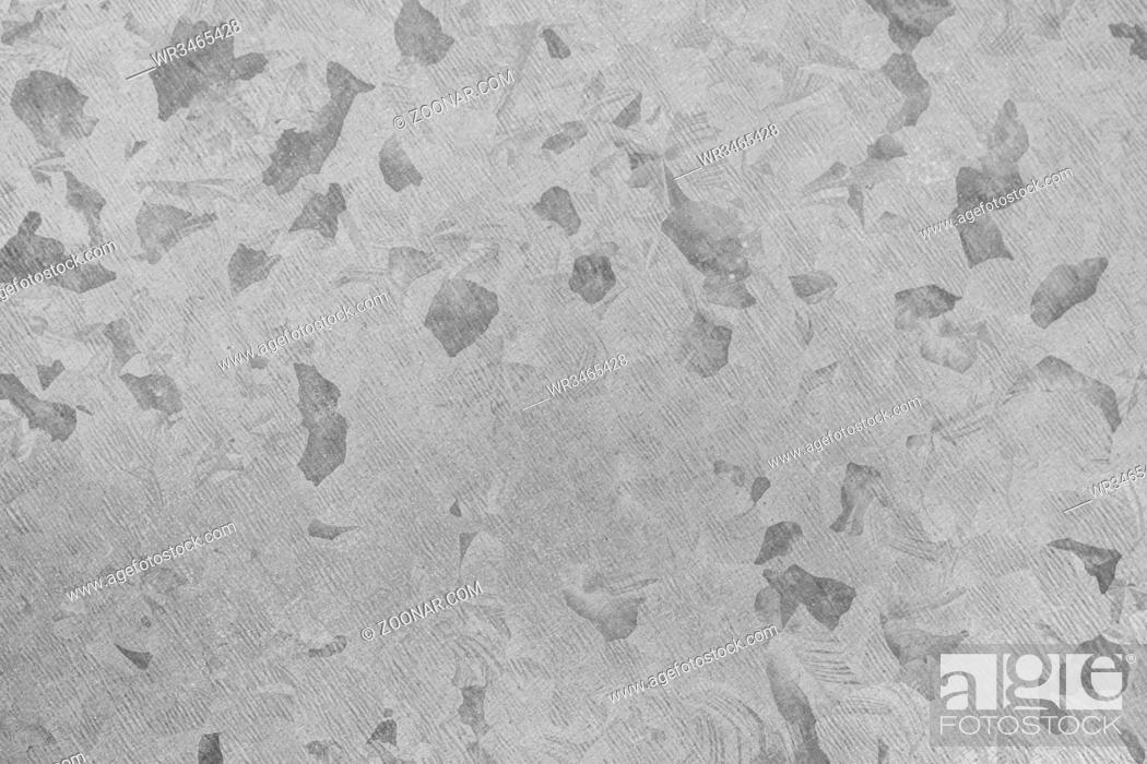 Imagen: Close-up of grey zinc background texture.