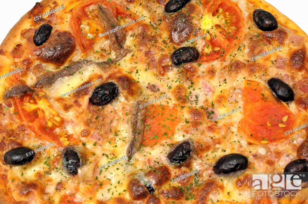 Stock Photo: detail of a pizza with anchovy tomato olives.
