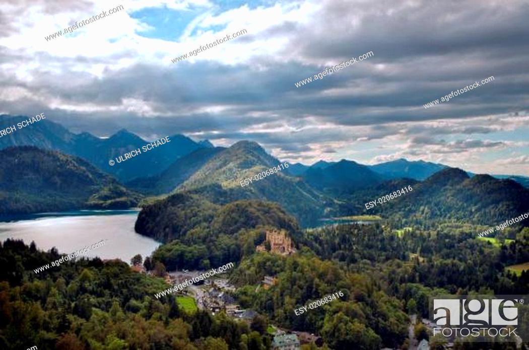 Stock Photo: Castle Hohenschwangau with alps in the background.