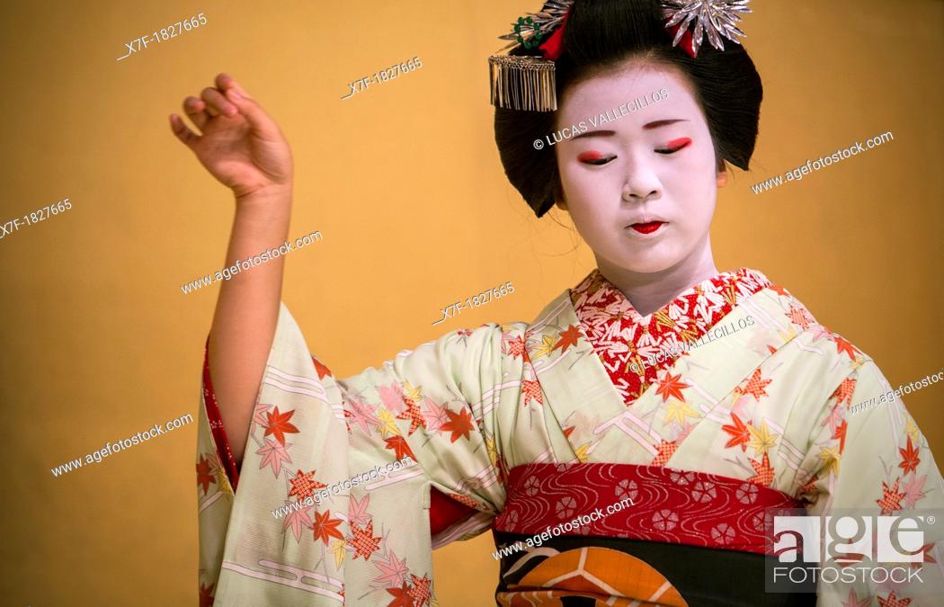Stock Photo: Show of Maikos, geisha apprenticesthey interpret Kyomai, is a Kyoto dance, at Gion Kobu Kaburenjo, geisha's distric of Gion, , Kyoto  Kansai, Japan.