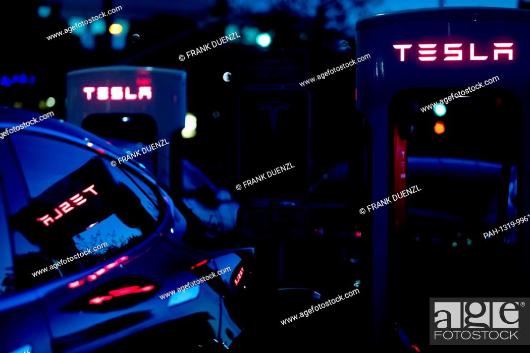 Stock Photo: Tesla Supercharger station stalls at the Qualcomm parking lot in Sorrento Valley, where many high tech, biotech, and IT companies are located, in Febuary 2018.