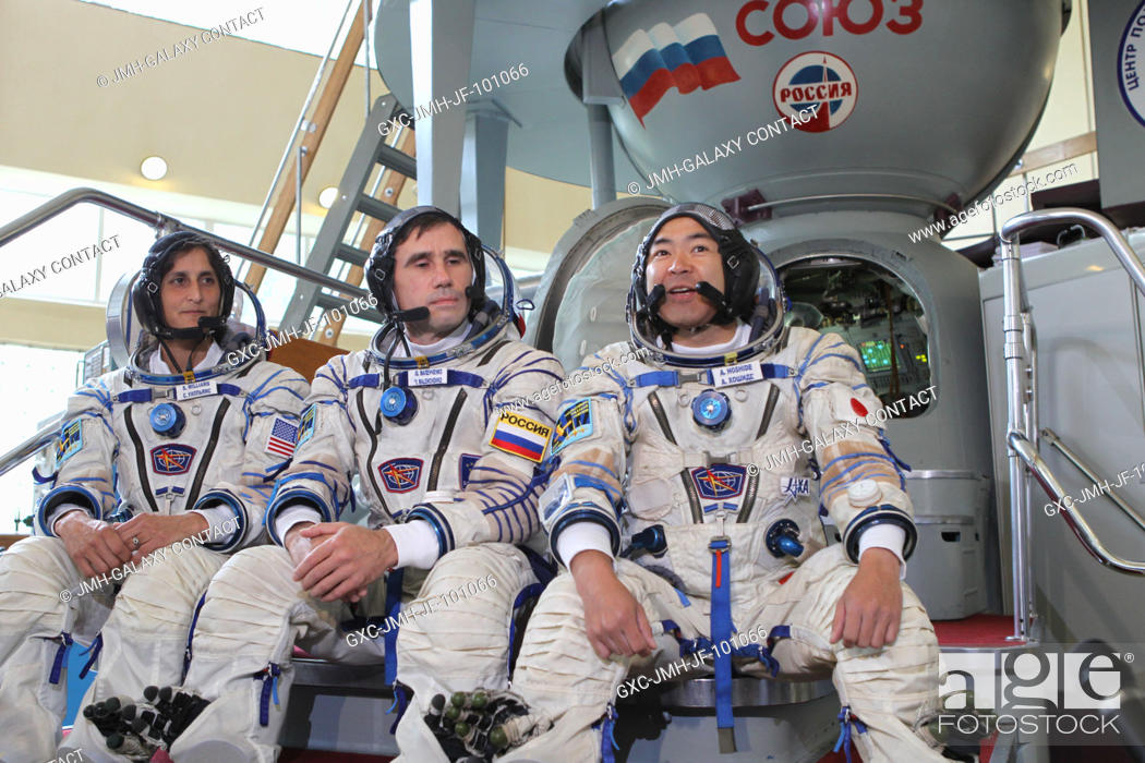 Stock Photo: Expedition 3233 NASA Flight Engineer Sunita Williams of NASA (left), Soyuz Commander Yuri Malenchenko (center), and Japan Aerospace Exploration Agency Flight.