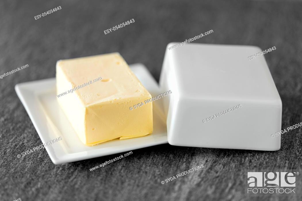 Stock Photo: close up of butter on stone table.