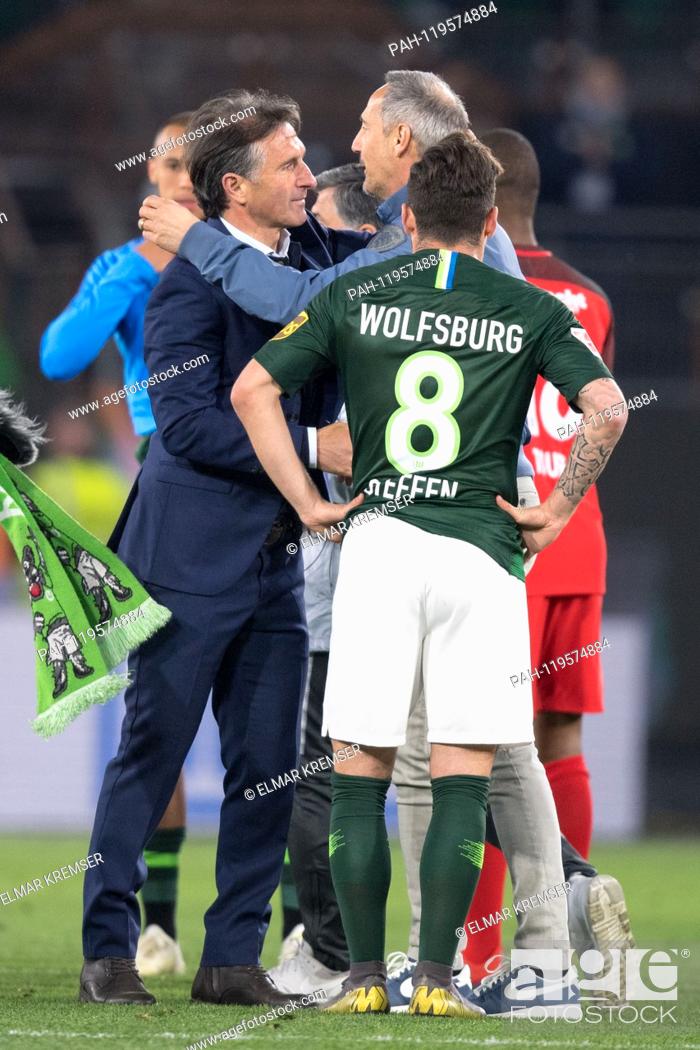 Stock Photo: coach Bruno LABBADIA (left, WOB) and Adi HUETTER (Hvºtter, coach, F) hug each other after the end of the game, hug, whole figure, upright, gesture, gesture.