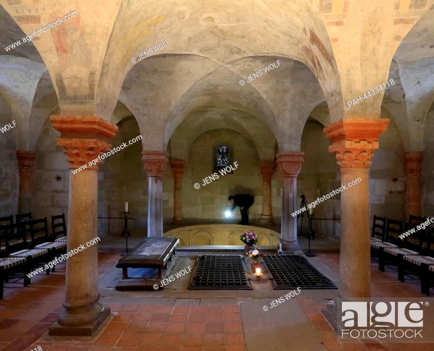 Stock Photo: A journalist films the Confessio in the crypt of collegiate church 'Sankt Servatius' in Quedlinburg, Germany, 18 November 2013.