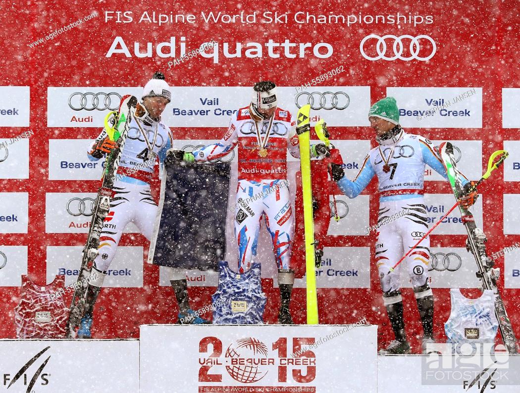 Stock Photo: (L-R) Fritz Dopfer of Germany (silver), Jean-Baptiste Grange of France (gold) and Felix Neureuther of Germany (bronze) during the winner's presentation of the.