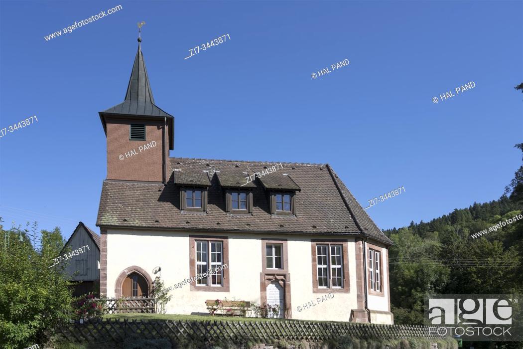 Stock Photo: little sankt Georg church at touristic historical village, shot in bright summer light at Betzweiler, Baden Wuttenberg, Germany.