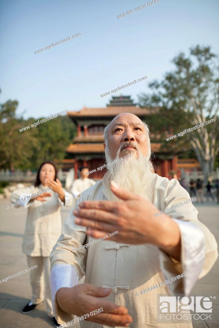 Stock Photo: Chinese Practicing Tai Ji.