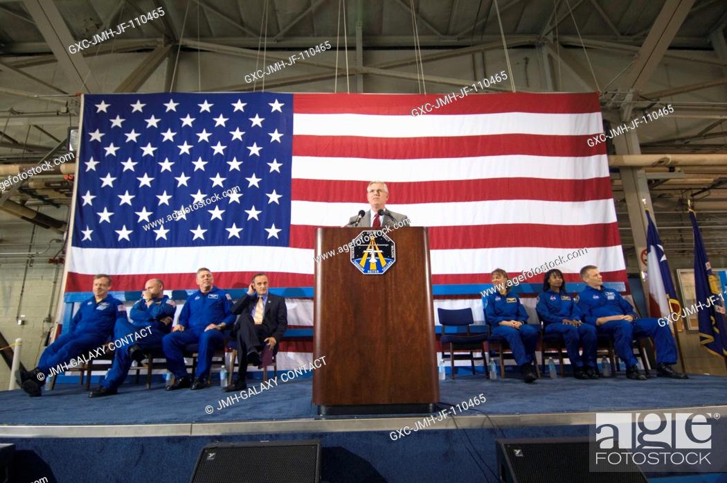 Stock Photo: Johnson Space Center's (JSC) director Michael L. Coats speaks from a lectern in Ellington Field's Hangar 276 near JSC during the STS-121 crew return ceremonies.