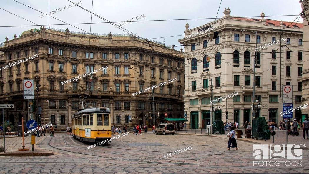 Stock Photo: italy city trip milan tram crossing urban square.