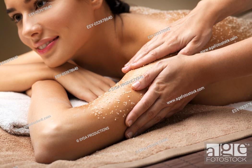 Stock Photo: close up of woman having salt massage at spa.
