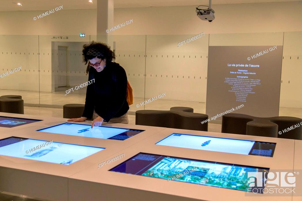Stock Photo: INTERACTIVE TABLE AT THE DISPOSAL OF VISITORS, VIDEO PROJECTION, MUSEUM OF THE LOUVRE, GALLERY OF TIME, LENS (62), NORD-PAS-DE-CALAIS, FRANCE.