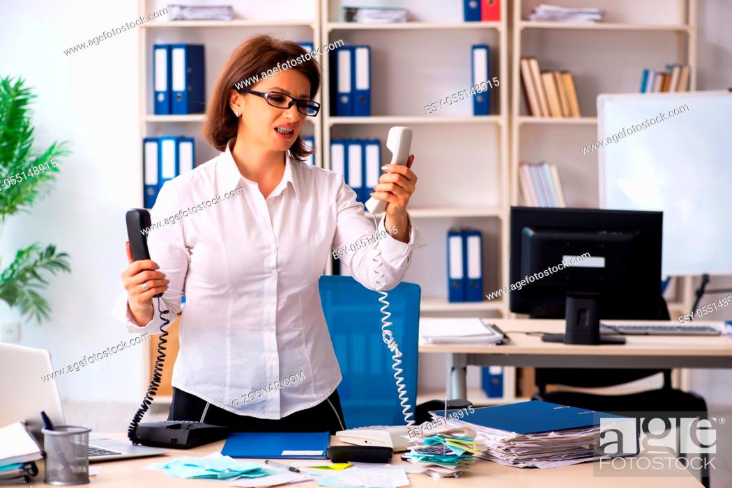 Stock Photo: Female employee in budget planning concept.