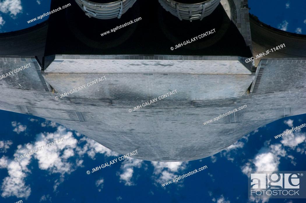 Stock Photo: This view of the aft underside of the Space Shuttle Atlantis was provided by an Expedition 21 crew member during a survey of the approaching vehicle prior to.