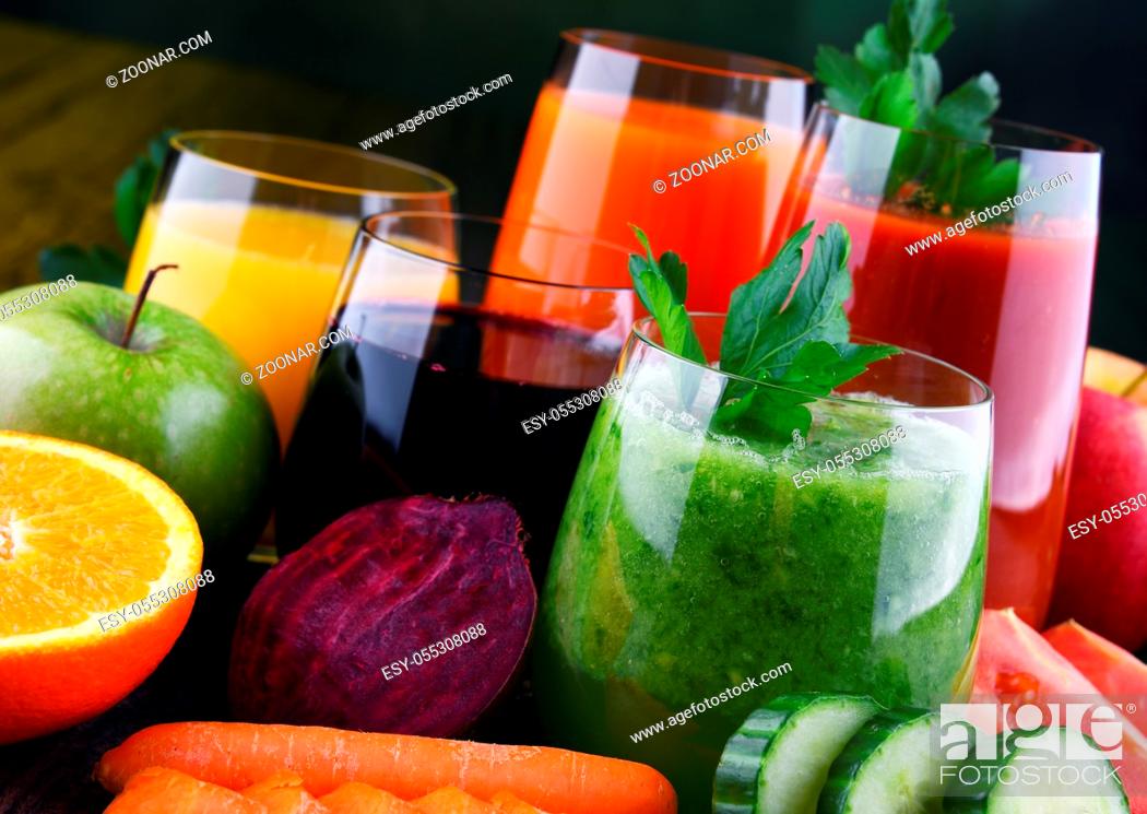Stock Photo: Glasses with fresh organic vegetable and fruit juices. Detox diet.