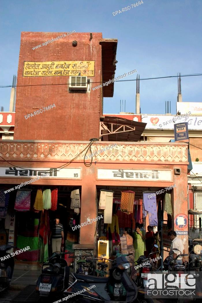 Stock Photo: Bapu Bazar ; market ; street scene ; transportation ; people in the local city market ; Jaipur ; Rajasthan ; India.