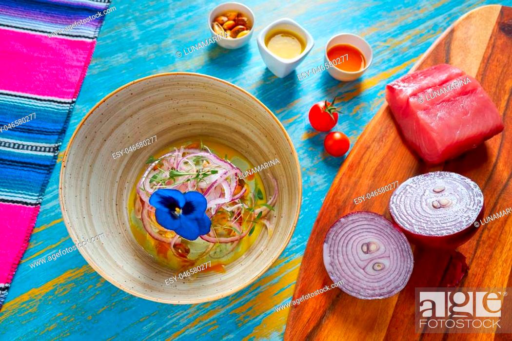 Stock Photo: Fish ceviche latin preuvian recipe on bowl with pansy flower.