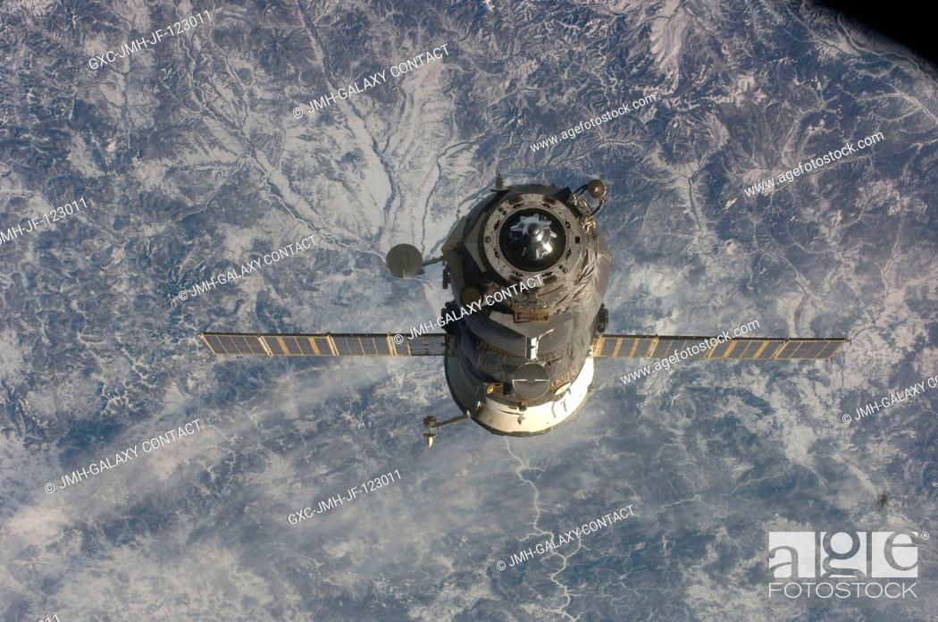 Stock Photo: An unpiloted ISS Progress 31 cargo craft, filled with trash and unneeded items, departs from the International Space Station's Pirs Docking Compartment at.