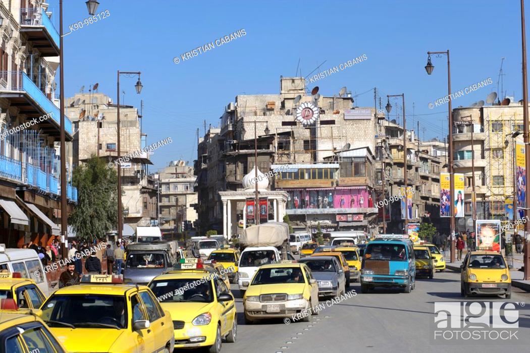 Stock Photo: Traffic jam in downtown Aleppo with yellow taxis lined up, Syria, Near East, Asia.