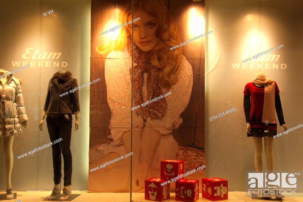 Stock Photo: Show window of a fashion boutiqe at downtown, Shantou, China.