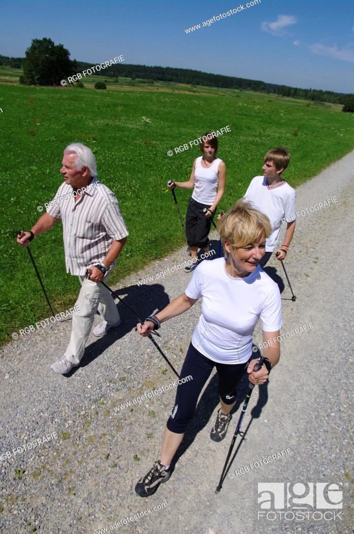 Stock Photo: Young and old, Nordic Walking in the Allgaeu, Germany, Europe.