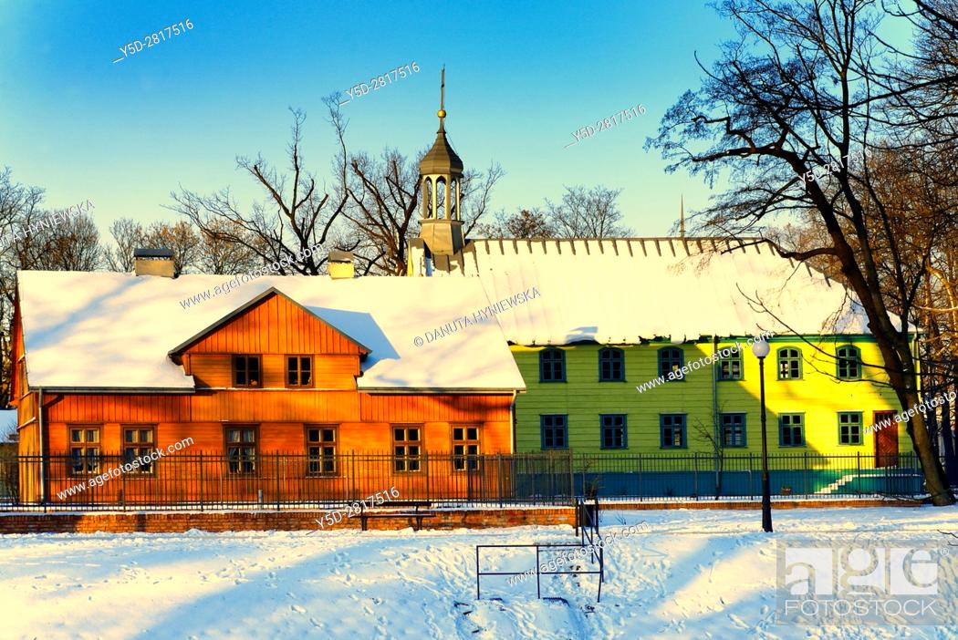 Stock Photo: Winter scene, Open-air Museum of regional Wooden Architecture - integral part of Central Museum of Textiles, located on main artery of Lodz - Piotrkowska Street.