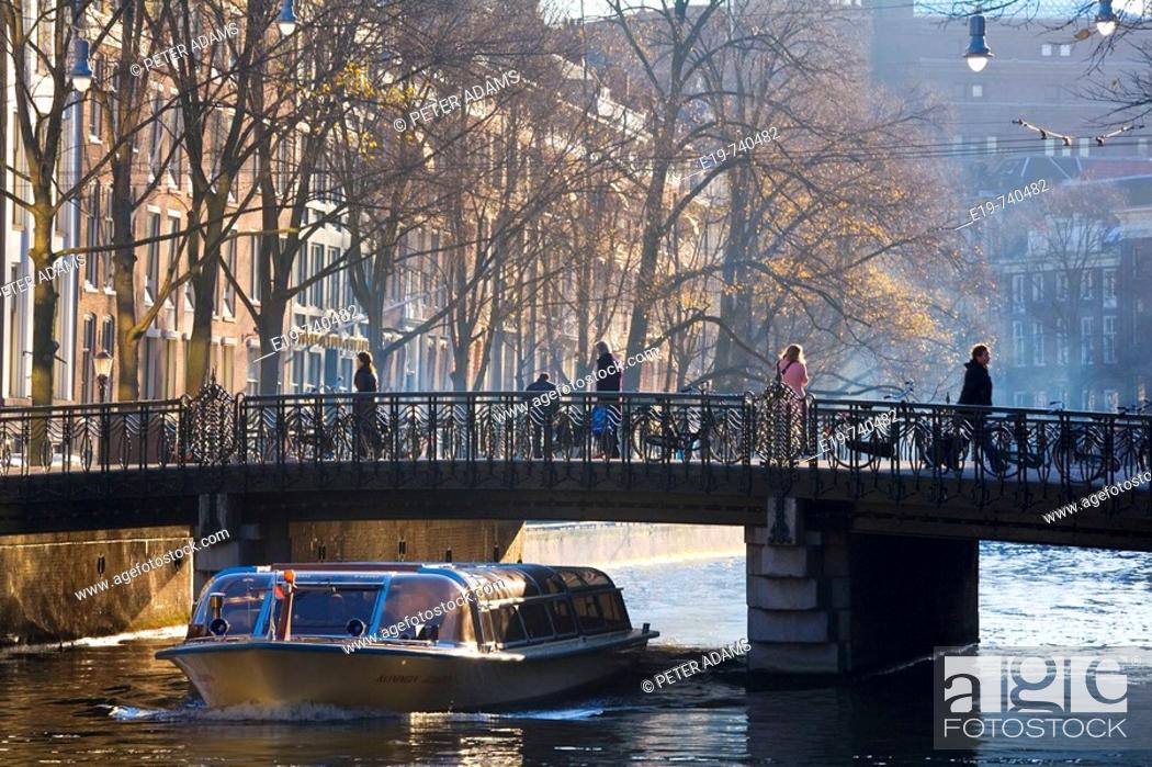 Stock Photo: Boat on Keizergracht, Amsterdam, The Netherlands.