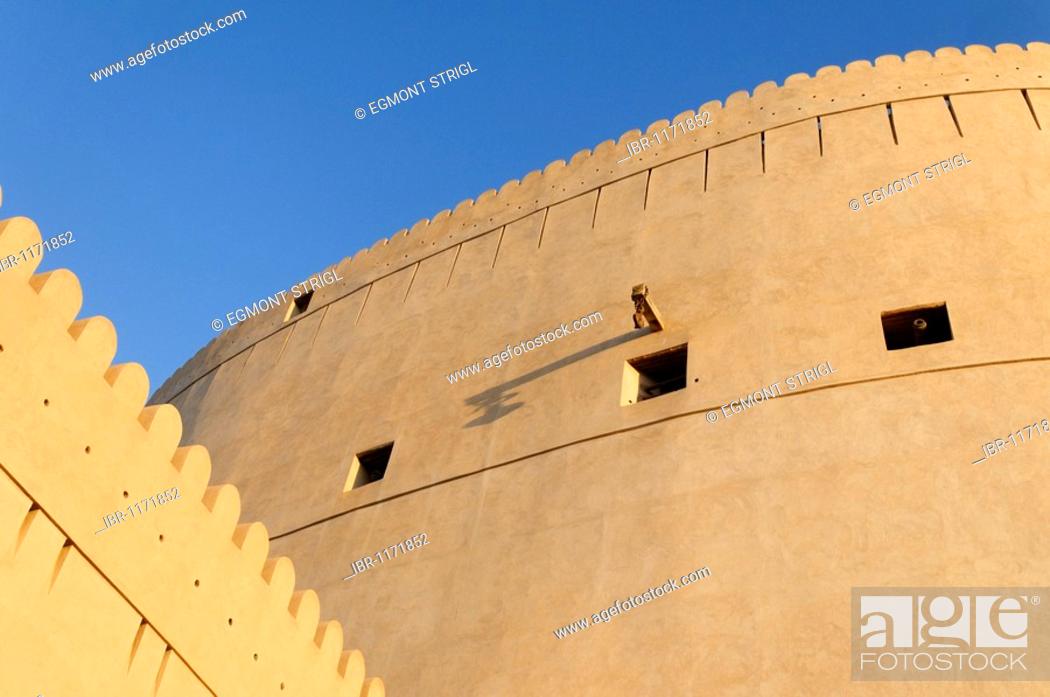 Stock Photo: Historic adobe fortification Nizwa Fort or Castle, Hajar al Gharbi Mountains, Dhakiliya Region, Sultanate of Oman, Arabia, Middle East.
