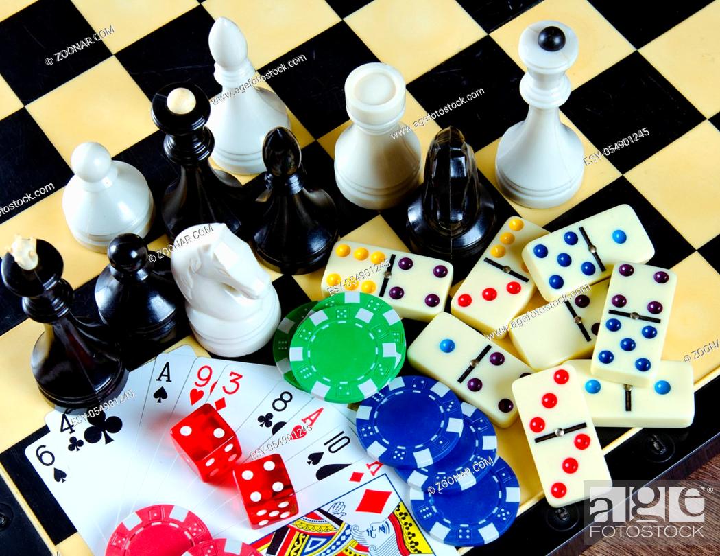 Stock Photo: The chess and other gaming accessories.