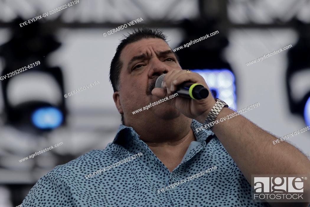 Stock Photo: MEXICO CITY, MEXICO - MAY 22, 2022: American singer Maelo Ruiz performs on stage during the Concert offered for mothers as part of the celebrations for Mother's.