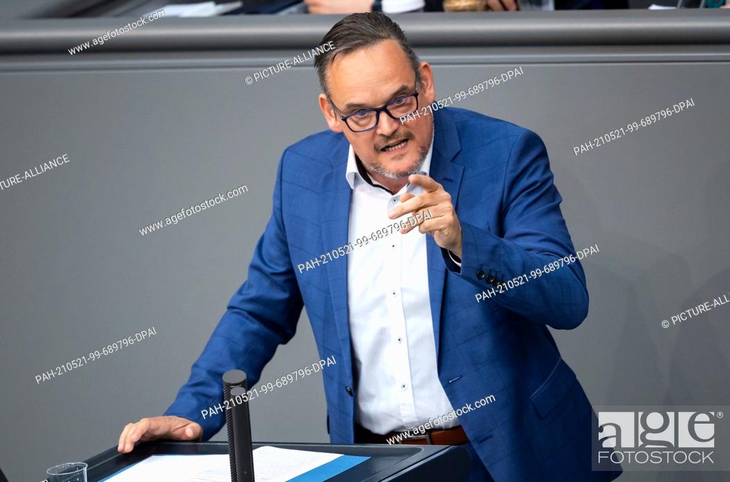 Stock Photo: 21 May 2021, Berlin: Martin Reichardt (AfD) speaks during the plenary session in the German Bundestag. The main topics of the 231st session of the 19th.