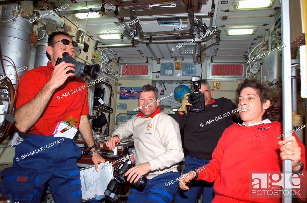 Stock Photo: Astronauts Steven L. Smith (left), STS-110 mission specialist, Stephen N. Frick, pilot, Lee M. E. Morin, mission specialist.