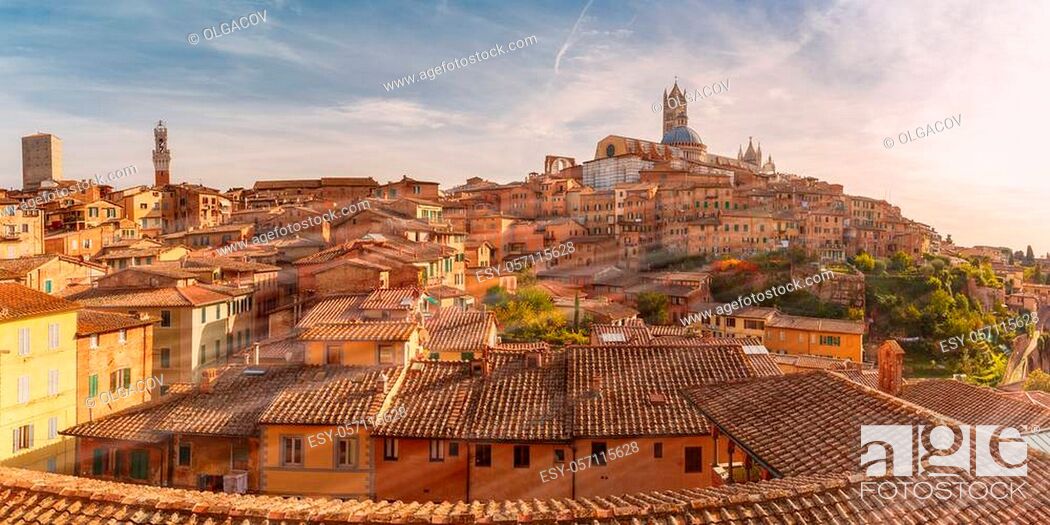 Stock Photo: Beautiful panoramic view of Old Town with Dome and campanile of Siena Cathedral, Duomo di Siena, and Mangia Tower or Torre del Mangia at sunset, Siena, Tuscany.