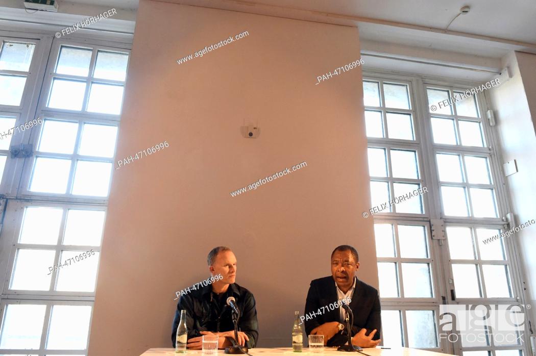 Stock Photo: US American artist Matthew Barney (L) and director of Haus der Kunst Munich Okwui Enwezor sit during a press conference about his exhibition ""Matthew Barney:.