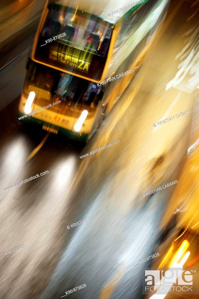 Stock Photo: Blurred city bus moving in high speed on the street in Wanchai (Wan Chai), Hong Kong, China, Southeast Asia.