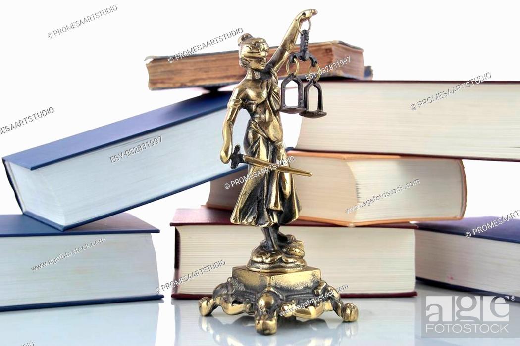 Stock Photo: Justice Statue and books. Lawyer background.