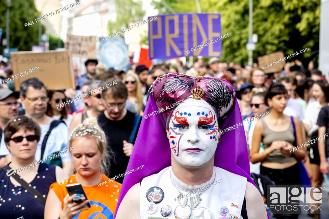 Stock Photo: 22 June 2019, Berlin: Sister Pia Pi Gravis Metallum takes part in the Pride Parade 2019. The participants protest against discrimination and want to celebrate.