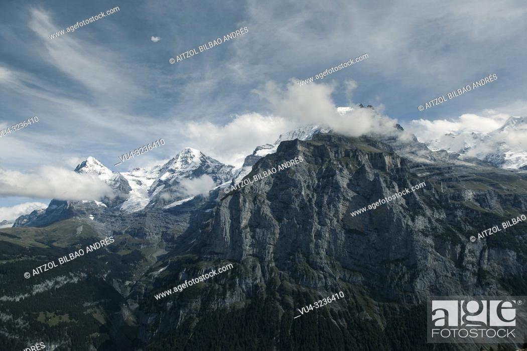 Stock Photo: Lauterbrunnen is situated in one of the most impressive trough valleys in the Alps, between gigantic rock faces and mountain peaks.