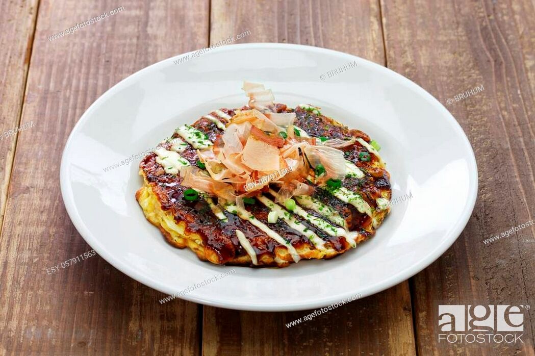Stock Photo: Okonomiyaki is a Japanese savory pancake containing a variety of ingredients.