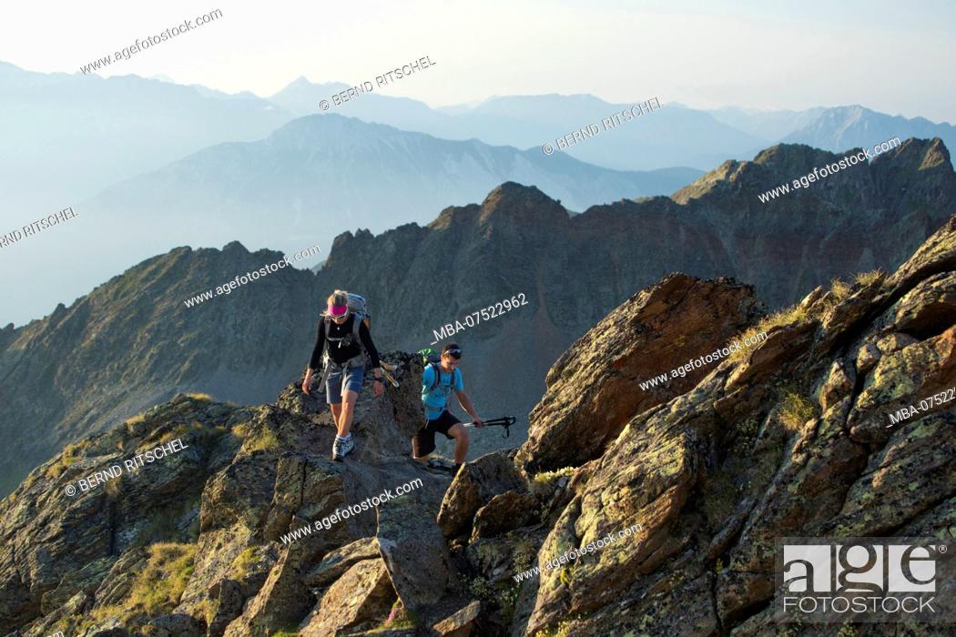 Stock Photo: Hiking scene on Gemeindekopf Mountain, Geigenkamm Range, Ötztal Alps, Tyrol, Austria.