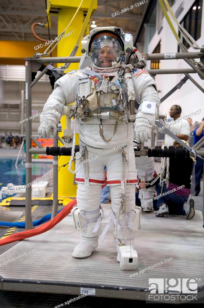 Stock Photo: Attired in a training version of his Extravehicular Mobility Unit (EMU) spacesuit, astronaut Doug Wheelock, Expedition 24 flight engineer and Expedition 25.