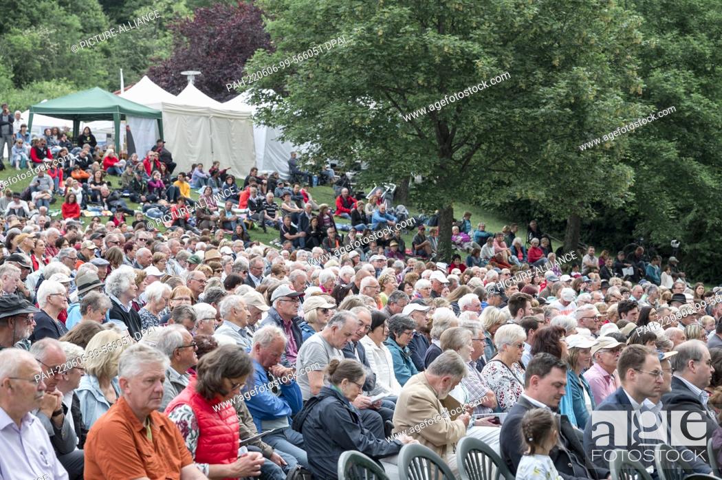 Stock Photo: 06 June 2022, Bavaria, Gerolfingen: Visitors follow the Bavarian Kirchentag. Under the motto ""Sticking together"", thousands of Christians attend the Bavarian.