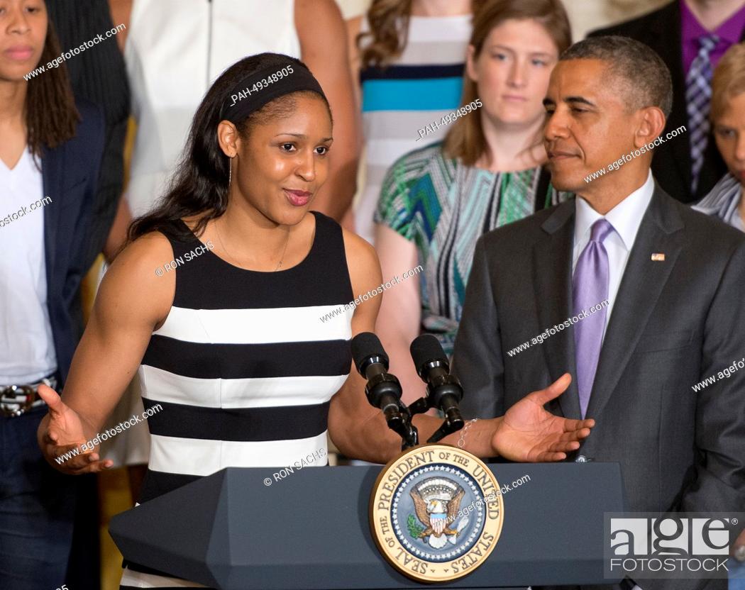 Stock Photo: Minnesota Lynx forward Maya Moore, left, makes remarks as United States President Barack Obama welcomes the WNBA Champions to the East Room of the White House.