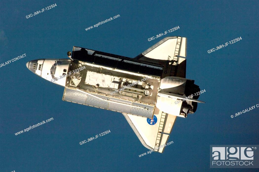 Stock Photo: Space Shuttle Discovery is featured in this image photographed by an Expedition 18 crewmember as the shuttle approaches the International Space Station during.