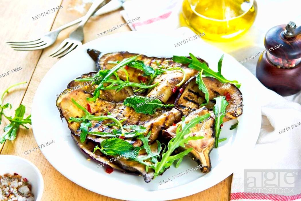 Stock Photo: Grilled Aubergine salad with Rocket.