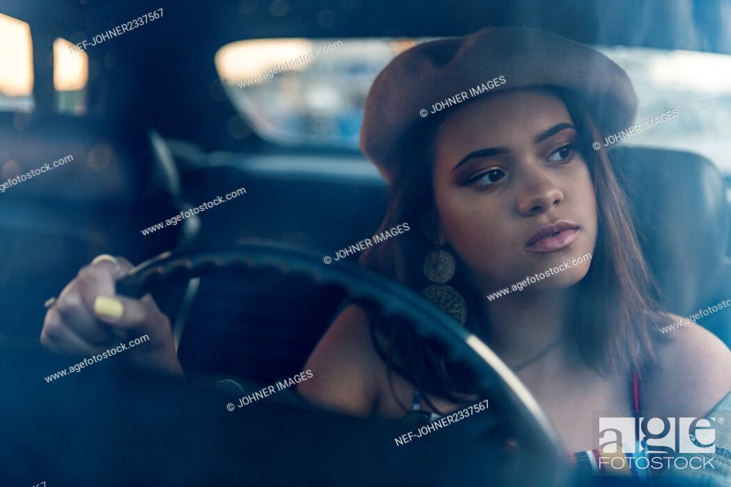 Stock Photo: Teenage girl in car.