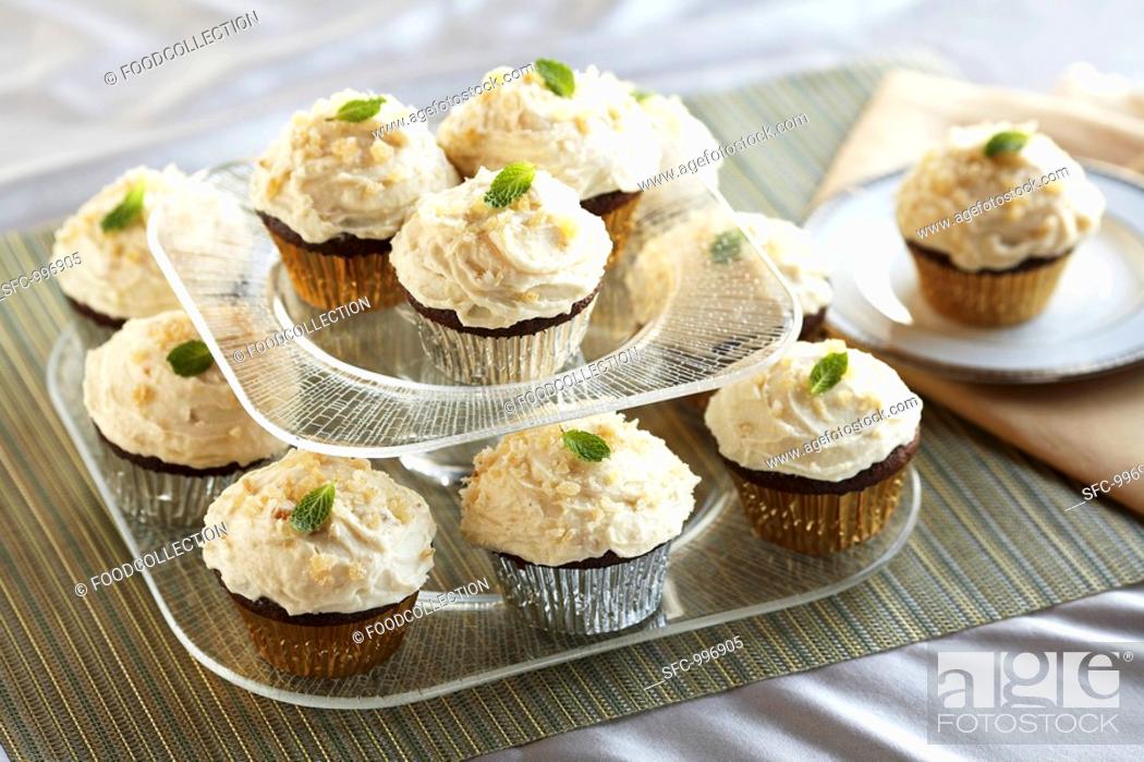 Stock Photo: Ginger Frosted Chocolate Cupcakes.